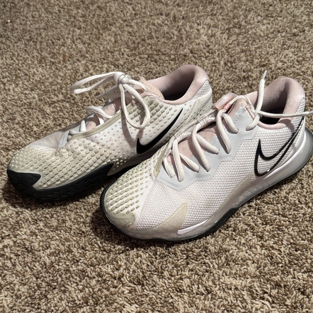 Woman’s Nike White and Black Sports Sneakers